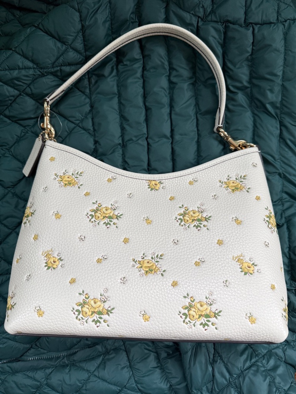 Coach White Floral Pebbled Leather Wristlet with Yellow Flowers - Picture 2 of 11